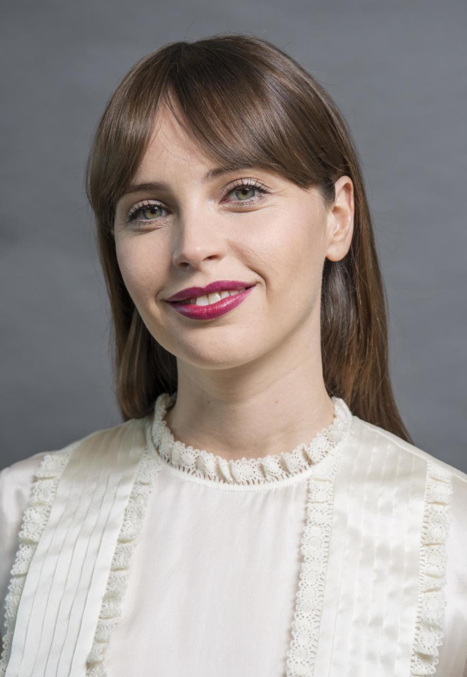 In this Dec. 4, 2016 photo, Felicity Jones, who plays Jyn Erso in "Rogue One: A Star Wars Story," poses for a photo in San Francisco. (Photo by Peter Barreras/Invision/AP)