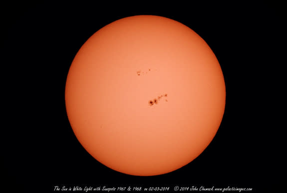 John Chumack sent Space.com this image of the sun in white light featuring gigantic sunspot group AR 1967 taken using a Baader Solar Filter Film from his backyard in Dayton, Ohio on Feb. 3, 2014 (Baader Solar Filter Film, 6" cave reflector, Can