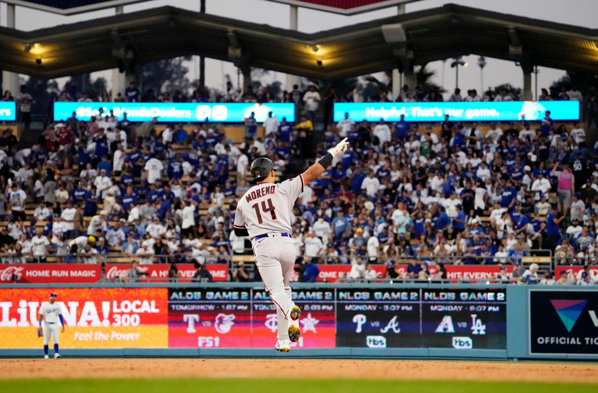 Arizona Diamondbacks left fielder David Peralta (6), second baseman Ketel  Marte (12), and center fielder Jake McCarthy (30) celebrate after closing  the ninth inning of a baseball game against the New York