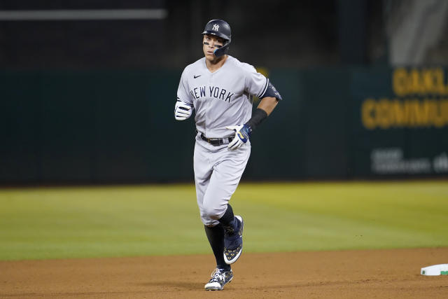 New York Yankees' Jose Trevino rounds the bases after hitting a