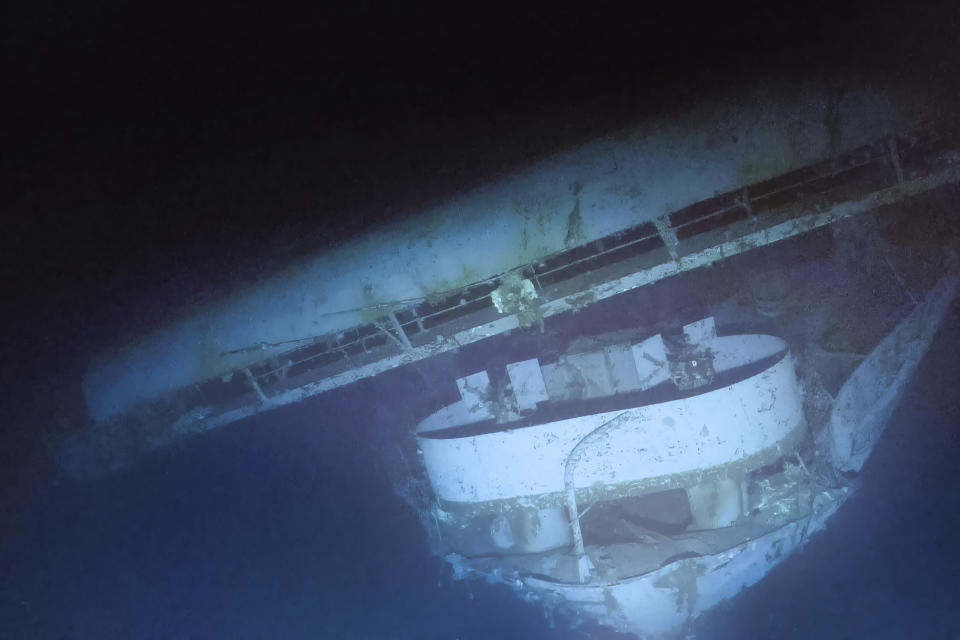 In this photo provided by the Ocean Exploration Trust, the starboard list of the aircraft carrier USS Yorktown on the seafloor can be seen in the flight deck, also collapsing towards the starboard side at the bow with an anti-aircraft gun tub below on Sept. 10, 2023. Footage from remote submersibles taken three miles under the Pacific Ocean is giving the world the first detailed glimpse of three World War II aircraft carriers that sunk in the pivotal Battle of Midway, which marked a shift in control of the Pacific naval theater from Japanese to U.S. forces.(Ocean Exploration Trust/NOAA via AP)