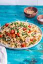 <p>This pasta is made with roasted tomatoes, pine nuts and a creamy tahini dressing. And you can serve it hot or cold. </p><p>Get the <a href="https://thecookreport.co.uk/halloumi-pasta/" rel="nofollow noopener" target="_blank" data-ylk="slk:Halloumi Pasta with Tahini Dressing;elm:context_link;itc:0;sec:content-canvas" class="link ">Halloumi Pasta with Tahini Dressing</a> recipe.</p><p>Recipe from <a href="https://thecookreport.co.uk/" rel="nofollow noopener" target="_blank" data-ylk="slk:The Cook Report;elm:context_link;itc:0;sec:content-canvas" class="link ">The Cook Report</a>.</p>