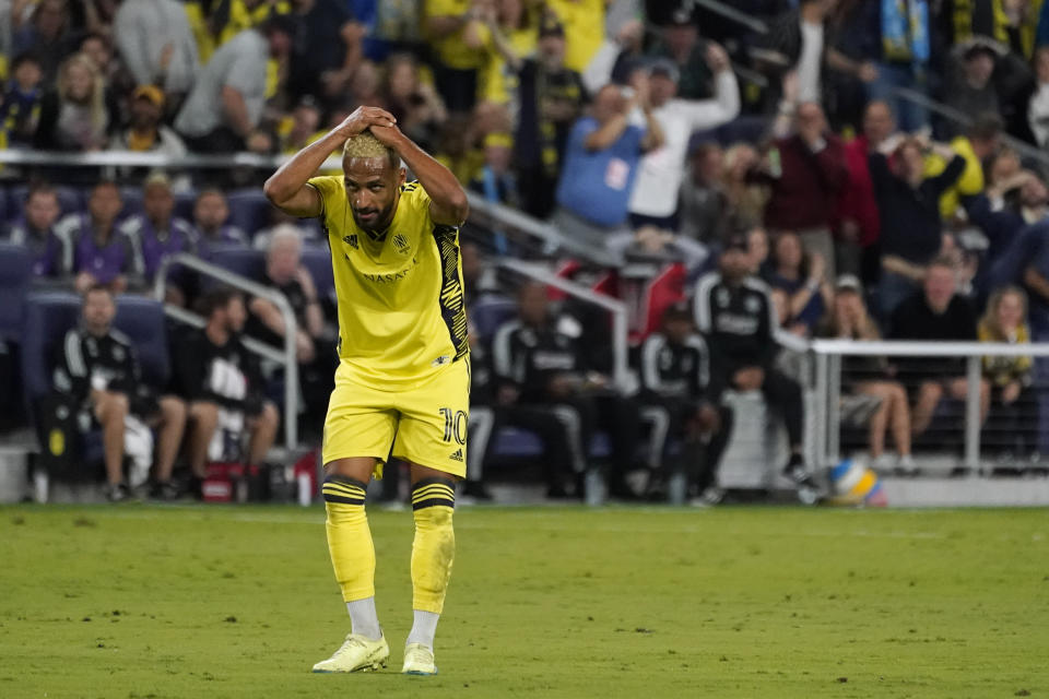 Nashville SC's Hany Mukhtar reacts to a missed shot against the Houston Dynamo during the first half of an MLS soccer match Sunday, Oct. 2, 2022, in Nashville, Tenn. (AP Photo/Mark Humphrey)