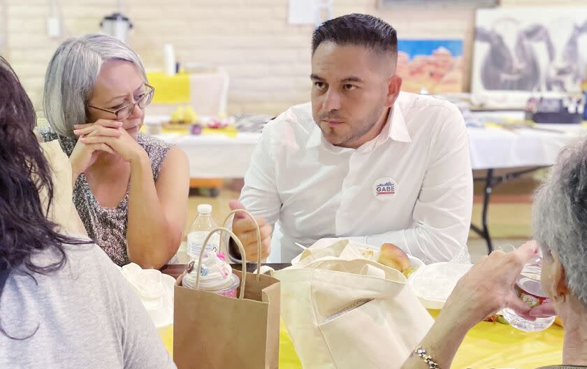 Gabe Vasquez, the Democratic candidate in New Mexico's 2nd district, mingled with residents at the Mimbres Valley Harvest Festival in Mimbres, New Mexico on September 24, 2022