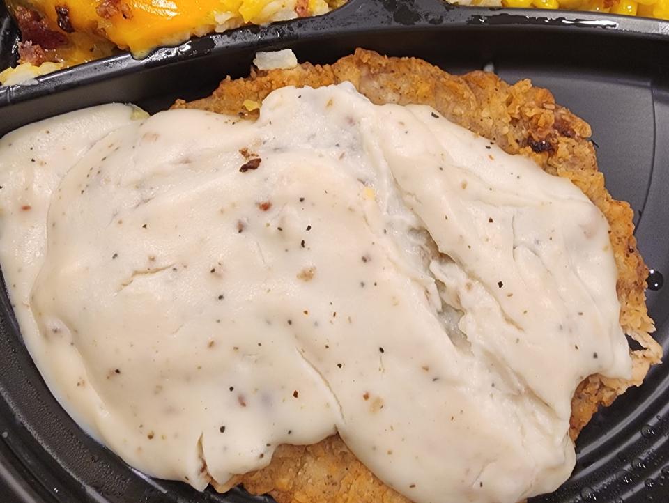 Cracker Barrel country-fried steak with corn and hash-brown casserole