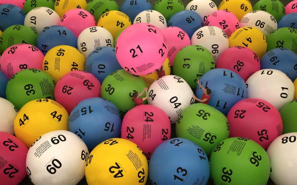 Anyone aged 16 or over can play the National Lottery - PA
