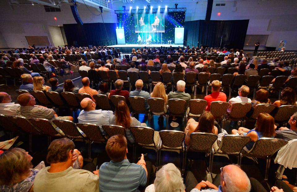 Guests listen as Pittsburgh Steelers defensive lineman Chris Wormley, onstage right, is interviewed by Erie Times-News sports editor Jeff Kirik during the Northwest Pennsylvania High School Sports Awards at the Bayfront Convention Center on June 16.