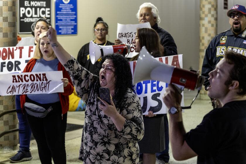 El Monte, CA - November 28: 1. Irma Zamorano, center, a community activist and former Mountain View school district board member, joins supporters of Mayor Jessica Ancona as they rally and hold a press conference at El Monte City Hall in El Monte Tuesday, Nov. 28, 2023. El Monte mayor allegedly sent a gang member and contacted a local resident's employer to intimidate her for criticizing the official, according to claims made in recent weeks by the resident in a lawsuit in federal courts she filed earlier this year against the mayor and the city. (Allen J. Schaben / Los Angeles Times)