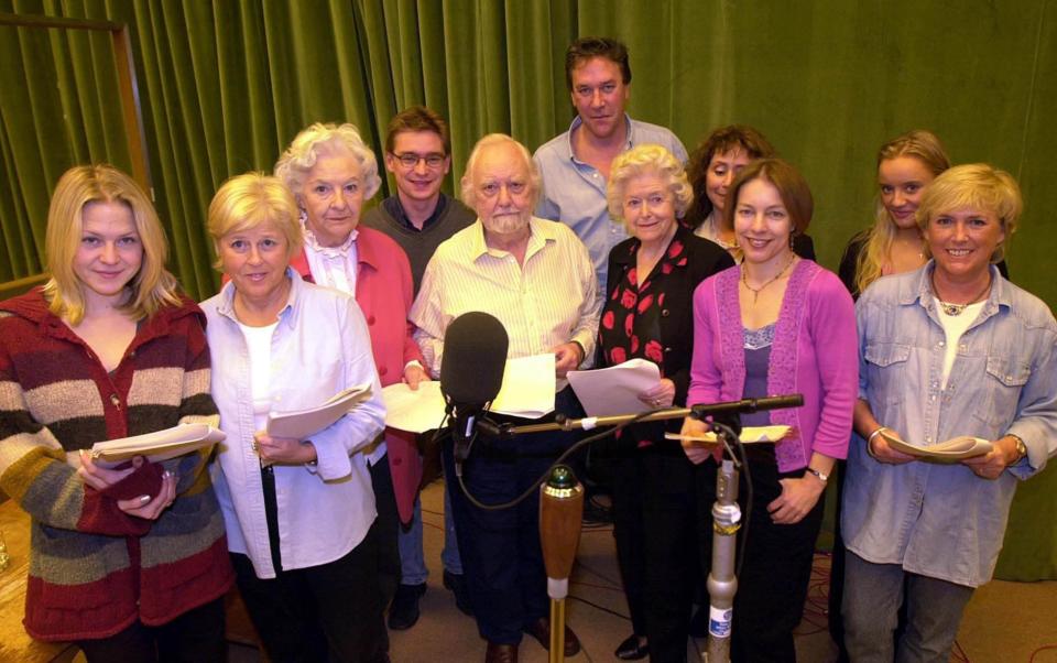 Spencer (centre, right) with the cast of The Archers ahead of recording the show’s 50th anniversary episode in 2001 - PA