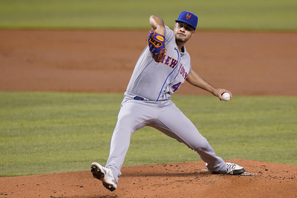 New York Mets starting pitcher Joey Lucchesi throws during the first inning of a baseball game against the Miami Marlins, Saturday, May 22, 2021, in Miami. (AP Photo/Lynne Sladky)