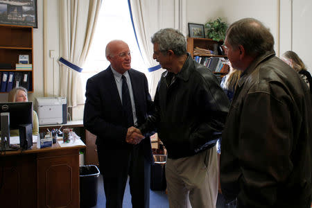 New Hampshire's Bill Gardner, the longest-serving secretary of state in the U.S., meets with people outside his office the morning before the state legislature meets to vote for secretary of state in Concord, New Hampshire, U.S., December 5, 2018. REUTERS/Elizabeth Frantz