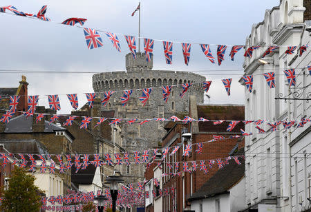 Bunting flutters in the wind in front of Windsor Castle, on the day before the royal wedding of Britain's Princess Eugenie and Jack Brooksbank, in Windsor, Britain, October 11, 2018. REUTERS/Toby Melville