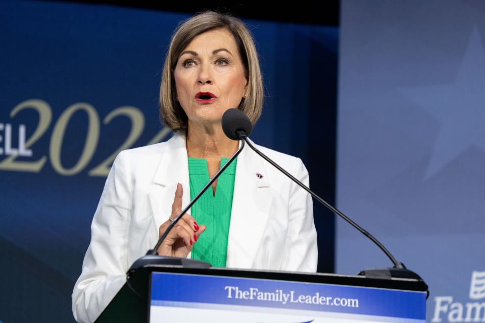 Gov. Kim Reynolds takes the stage during the Family Leadership Summit in Des Moines in July,
