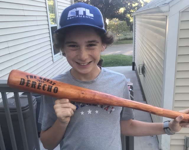 Tommy Rhomberg created an amazing baseball bat from a large branch he found in his yard after an intense storm. (Photo: Amanda Rhomberg)