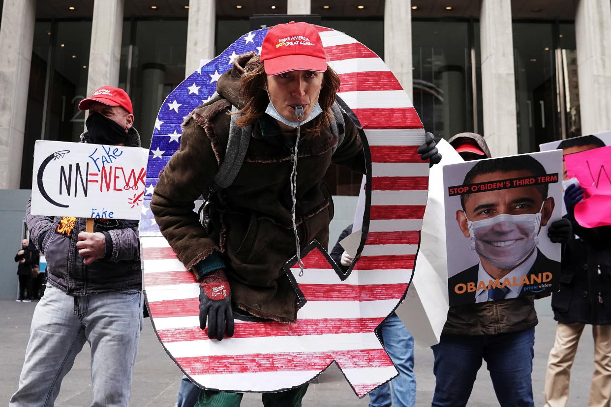 Qanon activists rally to show their support for Fox News outside their headquarters in the Manhattan borough of New York City, New York, U.S., November 2, 2020. REUTERS/Carlo Allegri