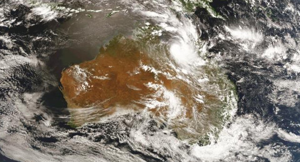 An expected cyclone forming over QLD