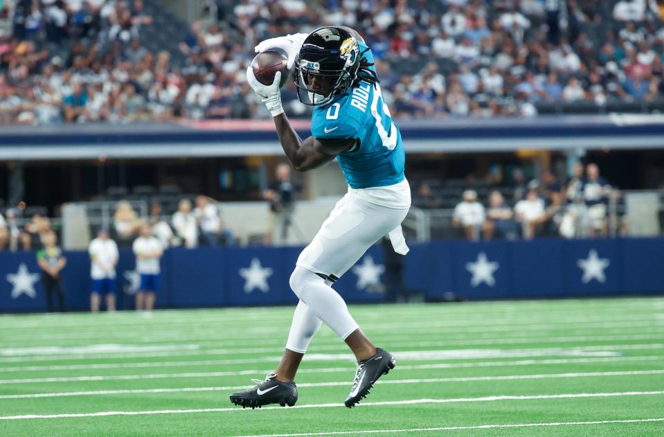 Aug 12, 2023; Arlington, Texas, USA; Jacksonville Jaguars wide receiver Calvin Ridley (0) makes a catch during the first quarter against the Dallas Cowboys at AT&T Stadium. Mandatory Credit: Kevin Jairaj-USA TODAY Sports