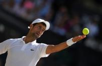 Tennis - Wimbledon - All England Lawn Tennis and Croquet Club, London, Britain - July 15, 2018 Serbia's Novak Djokovic in action during the men's singles final against South Africa's Kevin Anderson REUTERS/Tony O'Brien