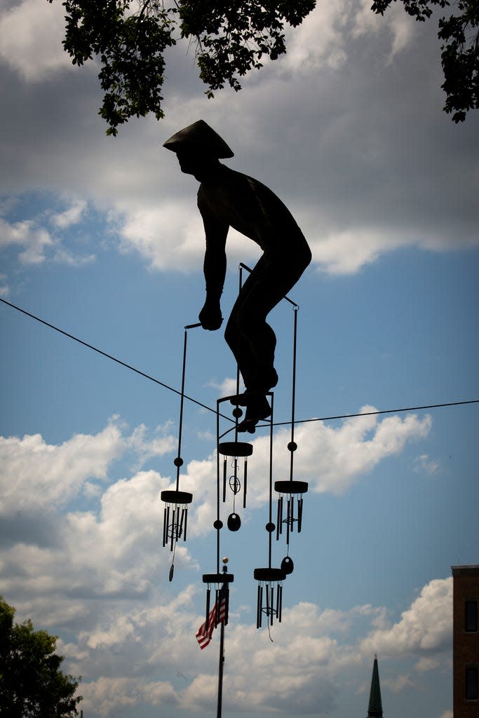 "Feng Shui," a coldcast bronze sculpture by Polish sculptor Jerzy Kedziora, appeared balanced between two trees in Lakeland's Munn Park for nearly five years but was taken down in 2019 ahead of an expected hurricane. The city noticed it had damage, and it hasn't been on display since. Now it's getting repairs for an expected return to the park.