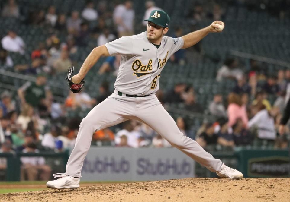 Oakland Athletics starter Zach Logue (67) pitches against the Detroit Tigers during seventh-inning action Wednesday, May 11, 2022, at Comerica Park in Detroit.