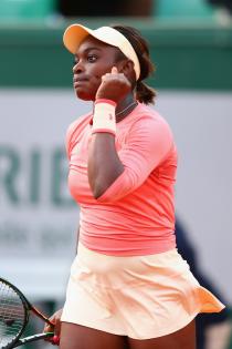 PARIS, FRANCE - MAY 25: Sloane Stephens of the United States celebrates match point in her Women&#39;s Singles match against Venus Williams of the United States on day two of the 2015 French Open at Roland Garros on May 25, 2015 in Paris, France. (Photo by Clive Brunskill/Getty Images)