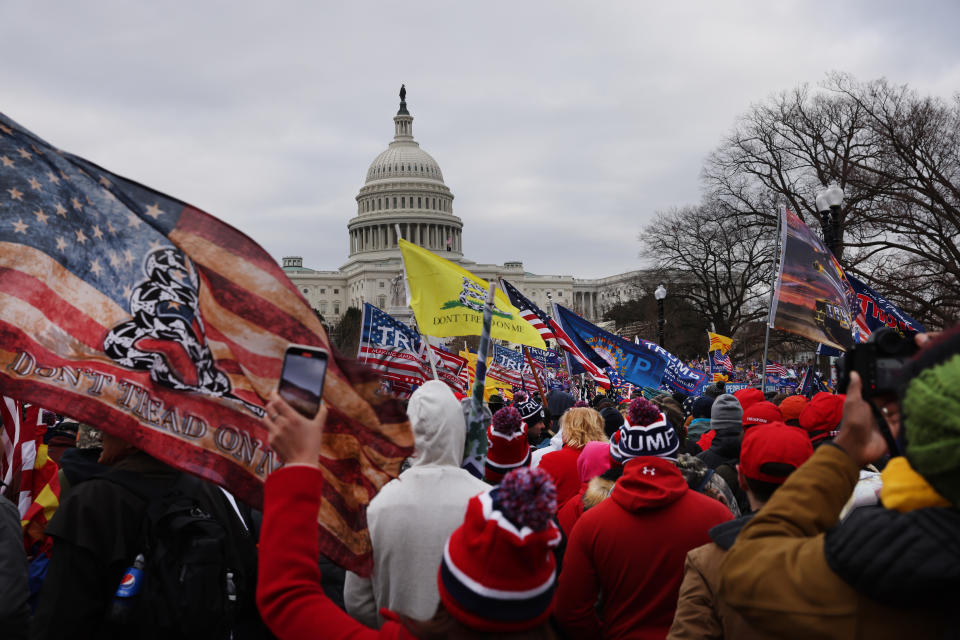 Thousands of Donald Trump supporters gather outside the U.S. Capitol building following a "Stop the Steal" rally on January 06, 2021 in Washington, DC. A large group of protesters stormed the historic building, breaking windows and clashing with police. Trump supporters had gathered in the nation's capital today to protest the ratification of President-elect Joe Biden's Electoral College victory over President Trump in the 2020 election. (Photo by Spencer Platt/Getty Images)