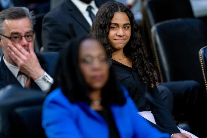 Leila Jackson, right, watches as her parents Dr. Patrick Jackson, left, and Supreme Court nominee Ketanji Brown Jackson, foreground, get emotional during a back and forth with Sen. Alex Padilla, D-Calif., during Jackson's Senate Judiciary Committee confirmation hearing on Capitol Hill on Wednesday.