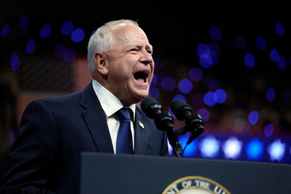 Walz drew cheers and laughter from the huge crowd in Philadelphia, Pennsylvania, as he alluded to a recent social media trend about his Republican counterpart JD Vance (AP).