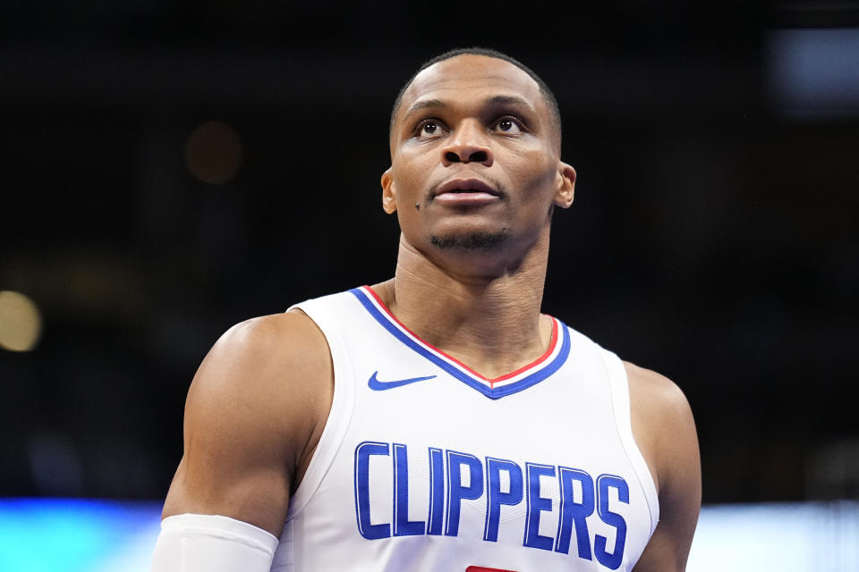 Los Angeles Clippers guard Russell Westbrook walks to the bench during the second half of the team's NBA basketball in-season tournament game against the Denver Nuggets on Tuesday, Nov. 14, 2023, in Denver. (AP Photo/Jack Dempsey)