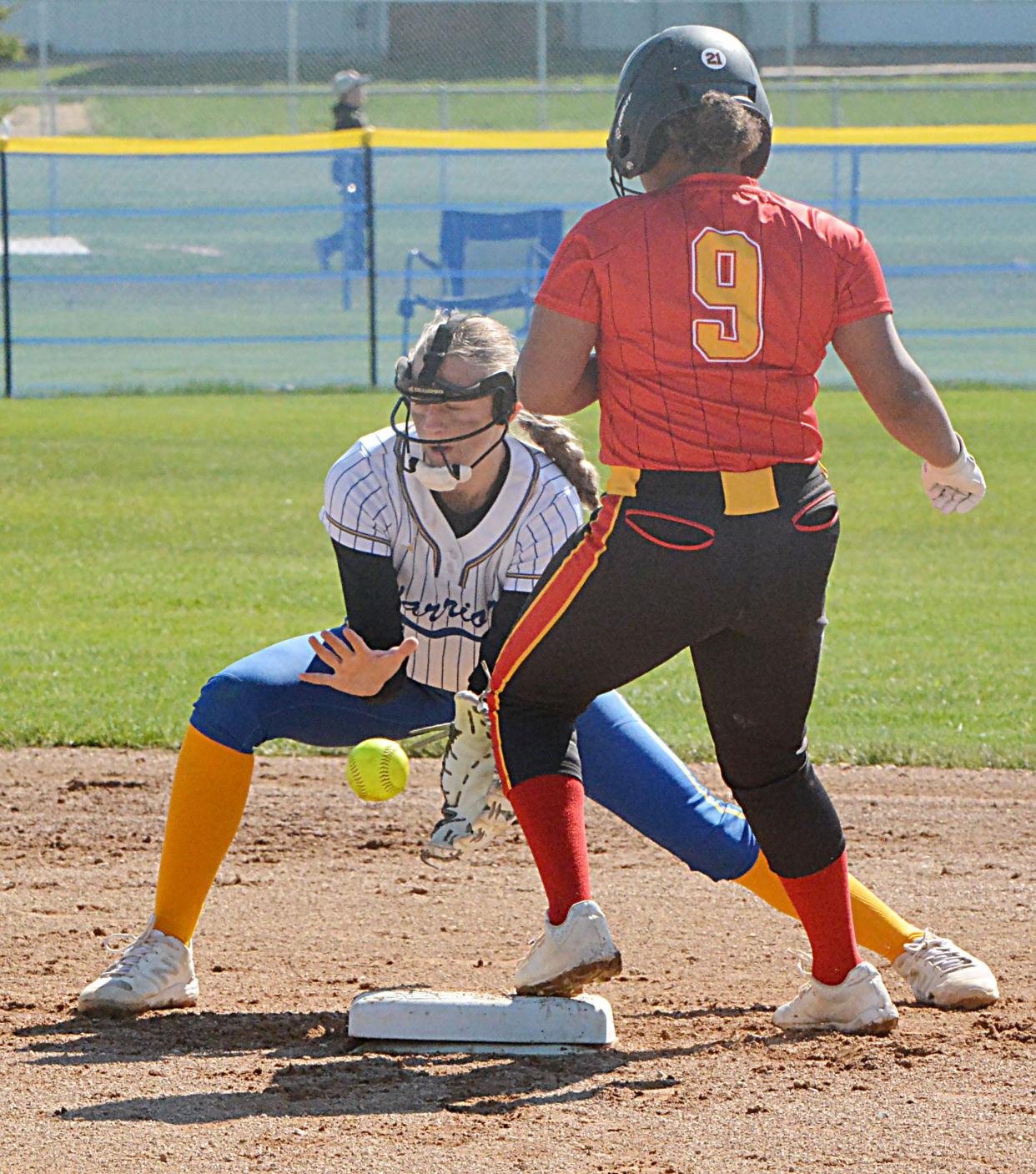 Avon's Pria Sesler steals second base ahead of the throw to Castlewood shortstop Sophia Kudrna during a high school fastpitch tripleheader on Saturday, May 4, 2024 in Castlewood.