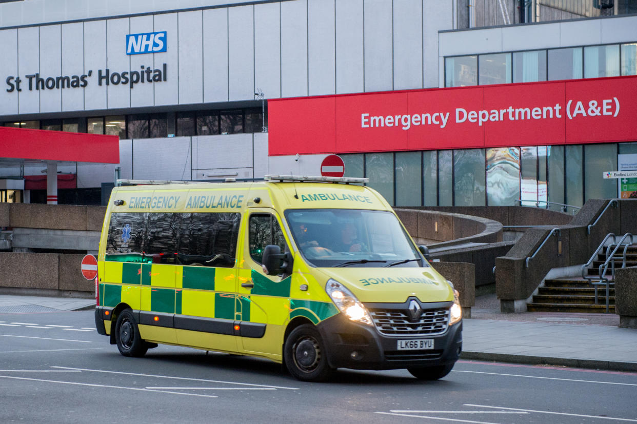 LONDON, ENGLAND - MARCH 24: An ambulance at NHS St Thomas's Hospital, A&E department on March 24, 2020 in London. British Prime Minister, Boris Johnson, announced strict lockdown measures urging people to stay at home and only leave the house for basic food shopping, exercise once a day and essential travel to and from work. The Coronavirus (COVID-19) pandemic has spread to at least 182 countries, claiming over 10,000 lives and infecting hundreds of thousands more. (Photo by Ollie Millington/Getty Images)