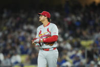 St. Louis Cardinals third baseman Nolan Arenado walks to his position after the fourth inning of a baseball game against the Los Angeles Dodgers Friday, March 29, 2024, in Los Angeles. (AP Photo/Jae C. Hong)