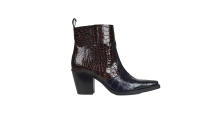 <p>For those of you willing to splurge this season, add Ganni’s most coveted boots to the top of your wish list. <em><a rel="nofollow noopener" href="https://www.ganni.com/en/callie-ankle-boots-S0748.html?dwvar_S0748_color=Ganache#cgid=dw-01-13-02&g=g&page=0-4&start=4" target="_blank" data-ylk="slk:Shop now;elm:context_link;itc:0;sec:content-canvas" class="link ">Shop now</a>.</em> </p>