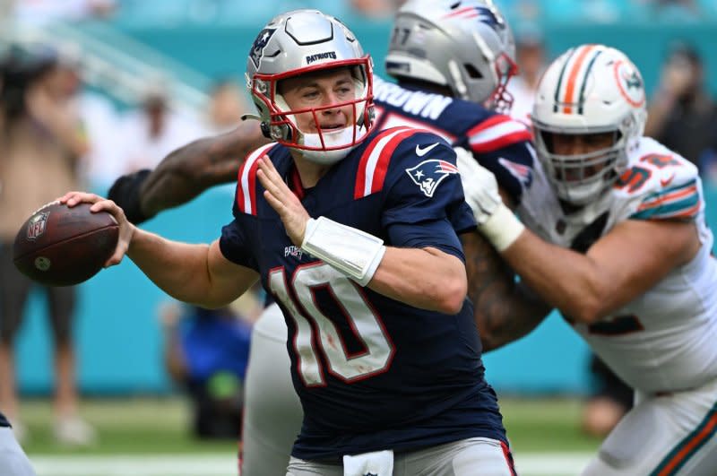 New England Patriots quarterback Mac Jones throws in the fourth quarter against the Miami Dolphins on Sunday at Hard Rock Stadium in Miami Gardens, Fla. Photo by Larry Marano/UPI