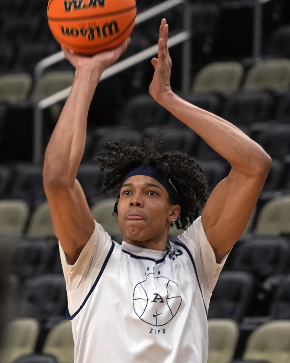 University of Akron's Enrique Freeman participates in the NCAA college men's basketball team practice at PPG Paints Arena in Pittsburgh, Wednesday, March 20, 2024. Akron will face Creighton in a first round tournament game on Friday. (AP Photo/Gene J. Puskar)