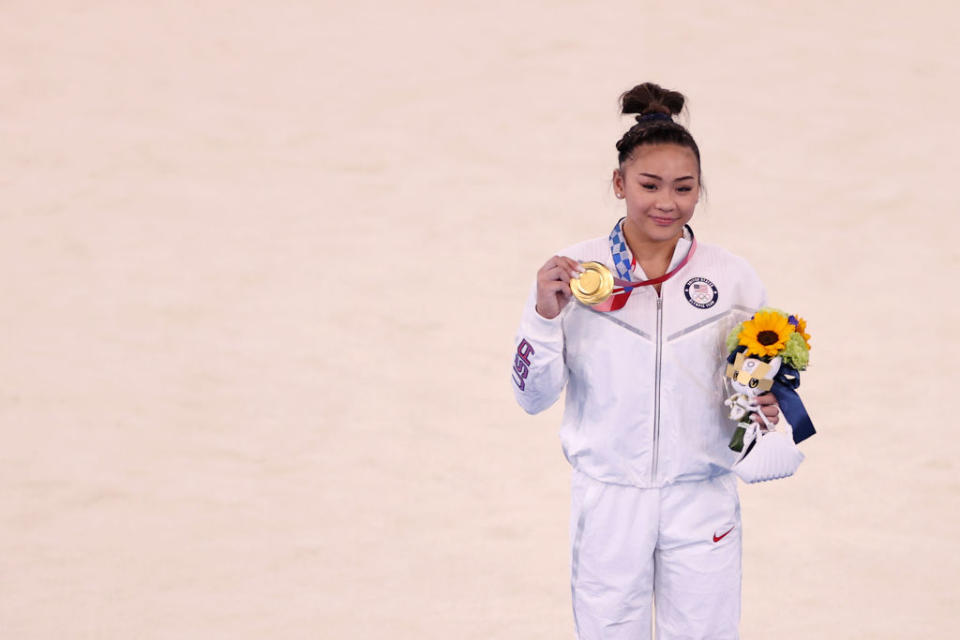 Sunisa Lee of Team USA poses with her gold medal after winning the Women's All-Around Final on day six of the Tokyo 2020 Olympic Games at Ariake Gymnastics Centre on July 29, 2021 in Tokyo, Japan.<span class="copyright">Laurence Griffiths—Getty Images</span>