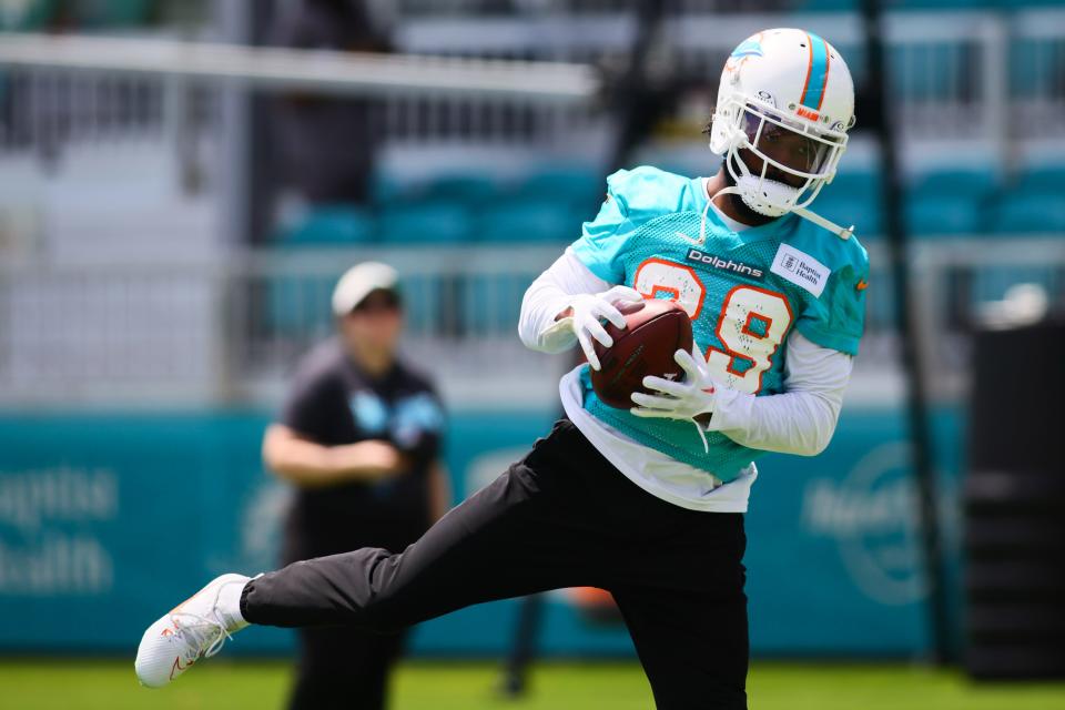 Jun 4, 2024; Miami Gardens, FL, USA; Miami Dolphins cornerback Kendall Fuller (29) catches the football during mandatory minicamp at Baptist Health Training Complex. Mandatory Credit: Sam Navarro-USA TODAY Sports