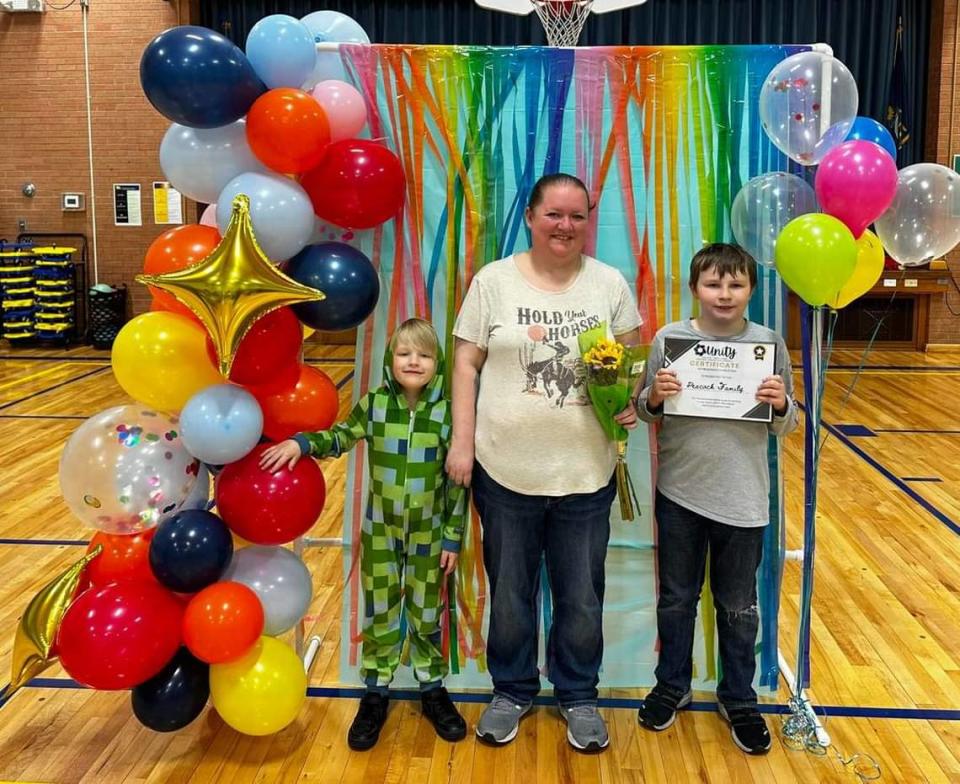 Beth Peacock with two of her sons, Conner and Bentley. Peacock says mold in her apartment caused health issues for her family.