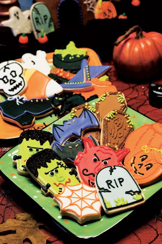 <p>Set out a platter of Frankenstein, bats, coffins, pumpkins, spiderwebs, and tombstone cookies, and watch them disappear.</p><p><em><strong><a href="https://www.womansday.com/food-recipes/food-drinks/a28861242/decorated-cookies-recipe/" rel="nofollow noopener" target="_blank" data-ylk="slk:Get the Decorated Cookies recipe.;elm:context_link;itc:0;sec:content-canvas" class="link ">Get the Decorated Cookies recipe.</a></strong></em></p>