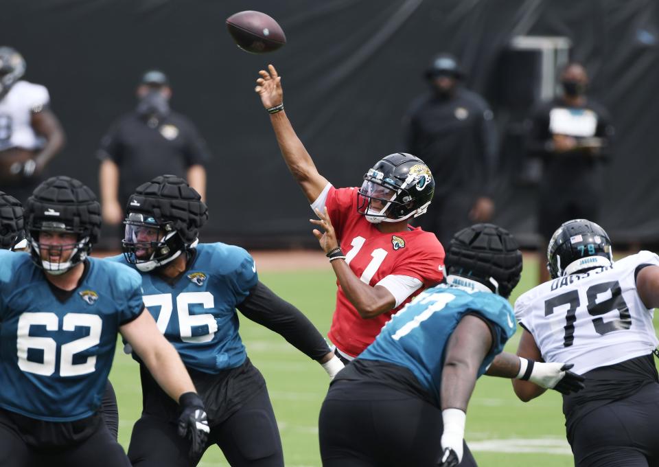 Jaguars quarterback #11, Joshua Dobbs gets off a pass during Saturday's team scrimmage at TIAA Bank Field. The Jacksonville Jaguars held a practice session and scrimmage at TIAA Bank Field in Jacksonville, Florida Saturday, August 29, 2020. Selected guests and members of the media were invited to the soft opening of the stadium with new accommodations made to help reduce the chance of spreading the coronavirus. Seating capacity is limited and much of the available seating has been closed off to encourage social distancing. There is little opportunity for physical contact with doors, food purchasing and shopping inside the stadium with cashless and online purchasing.  [Bob Self/Florida Times-Union]