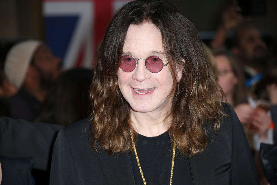 FILE - In this Sept. 28, 2015 file photo, Ozzy Osbourne poses for photographers upon arrival at the Pride of Britain Awards 2015 in London.  ocker Ozzy Osbourne is in a hospital. Sharon Osbourne wrote on Twitter Wednesday, Feb. 6, 2019,  the 70-year-old was admitted “following some complications from the flu.” She wrote doctors believe “this is the best way to get him of a quicker road to recovery.”(Photo by Joel Ryan/Invision/AP, File)