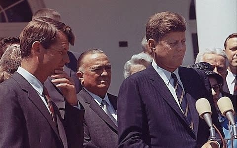 US President John F. Kennedy (R) with Attorney General Robert F. Kennedy (L), FBI Director J. Edgar Hoover in 1963 - Credit: FBI