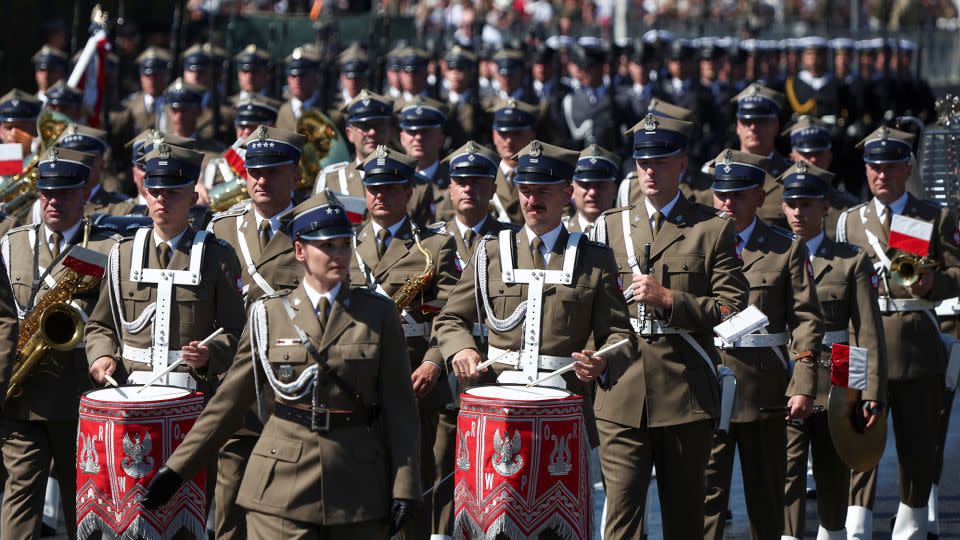 Members of military band arrive for the Armed Forces Day parade. - Kacper Pempel/Reuters