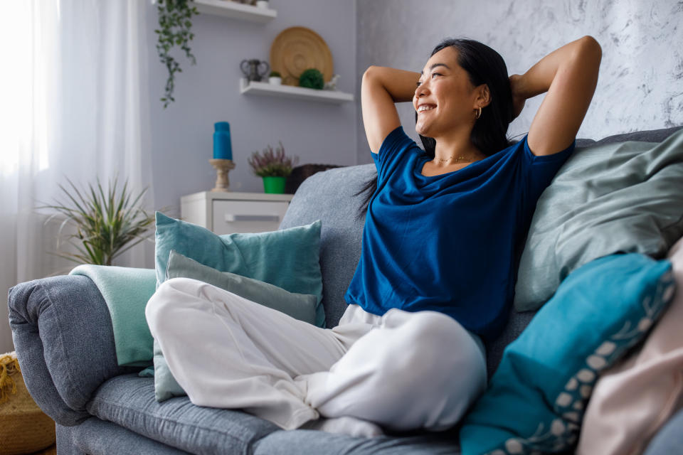 person stretched out on couch