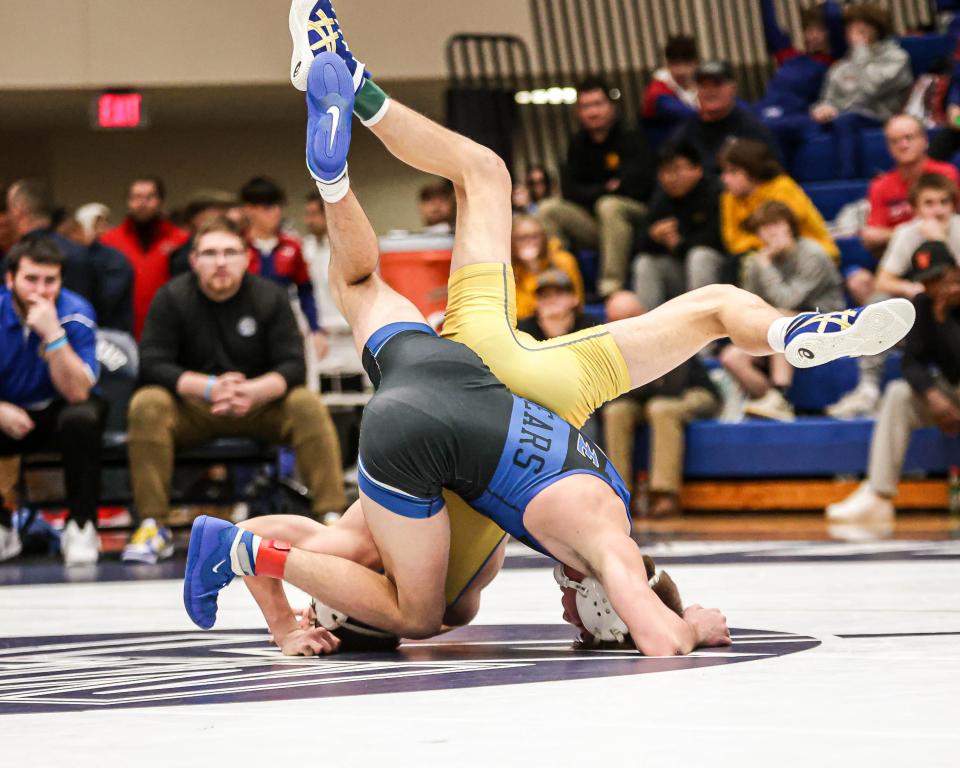 Karter Adams (Northern Lebanon) gets taken down by Francis Burke (Elizabethtown) in the 127 lb. Championship match. The Lancaster Lebanon League Wrestling Championships were held at Manheim Township on Saturday January 27, 2024.