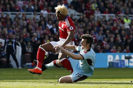 Britain Football Soccer - Middlesbrough v Burnley - Premier League - The Riverside Stadium - 8/4/17 Middlesbrough's Adama Traore in action with Burnley's Joey Barton Action Images via Reuters / Craig Brough Livepic