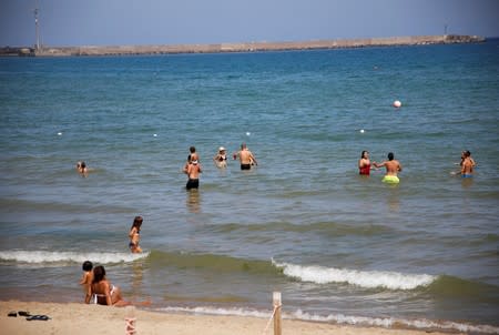 Italians enjoy their holidays at the beach in Catania, Sicily