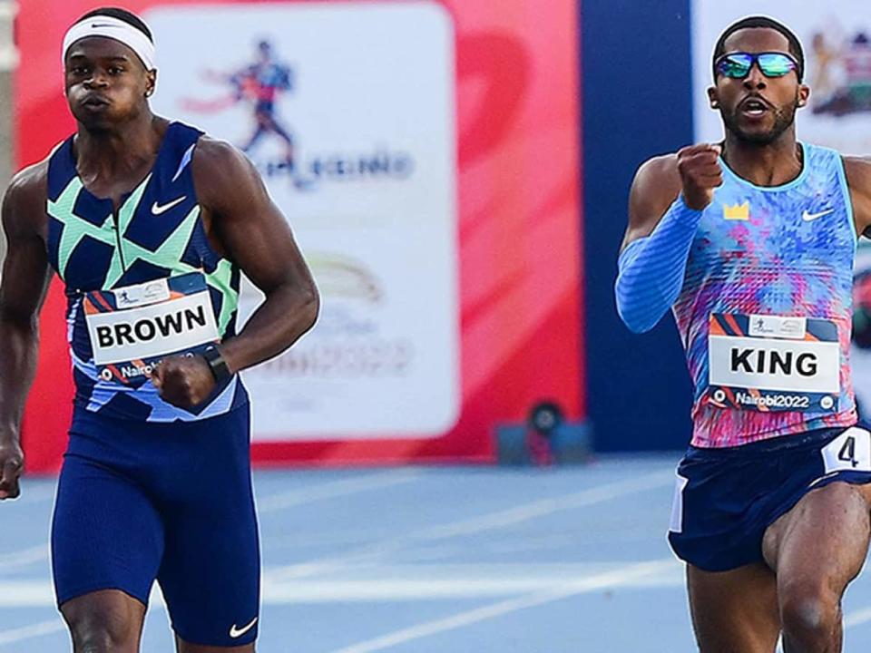 Canada's Aaron Brown beats American Kyree King to the finish line in the men's 200 metres at the Kip Keino Classic in Nairobi, Kenya. Brown’s time of 20.05 seconds at the World Athletics Continental Tour Gold meet is his fastest-ever to open a season at the distance. (Tony Karumba/AFP via Getty Images - image credit)