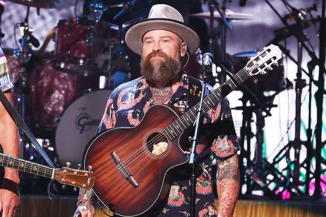 <p>Christopher Polk/Variety via Getty</p> Zac Brown performs at the CMA Awards in November 2023