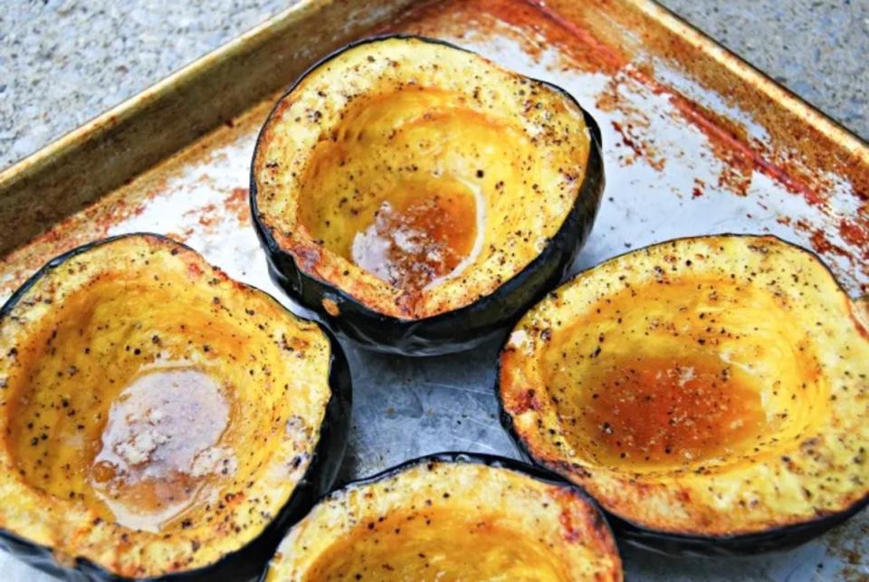 <p>Krista Marshall</p><p>These roasted acorn squash are sweet and savory. You can scoop the squash out into a dish and serve <a href="https://www.yahoo.com/lifestyle/101-family-quotes-show-ones-212045719.html" data-ylk="slk:family;elm:context_link;itc:0;sec:content-canvas;outcm:mb_qualified_link;_E:mb_qualified_link;ct:story;" class="link  yahoo-link">family</a> style, or serve each person a half. </p><p><strong>Get the recipe: <a href="https://parade.com/842771/kristamarshall/roasted-acorn-squash-2/" rel="nofollow noopener" target="_blank" data-ylk="slk:Roasted Acorn Squash;elm:context_link;itc:0;sec:content-canvas" class="link ">Roasted Acorn Squash</a></strong></p><p><strong>Related: <a href="https://parade.com/1385140/felicialim/delicata-squash-recipes/" rel="nofollow noopener" target="_blank" data-ylk="slk:40 Best Delicata Squash Recipes;elm:context_link;itc:0;sec:content-canvas" class="link ">40 Best Delicata Squash Recipes</a></strong></p>